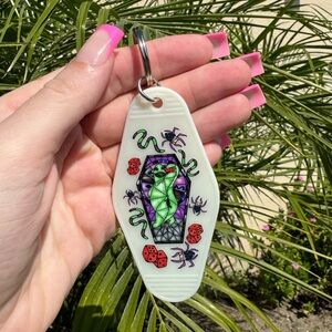 GLOW IN THE DARK OOGIE BOOGIE MOTEL KEYCHAIN